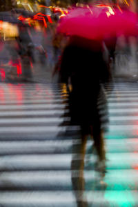 Rushing Red Umbrella • ©Pierre Hauser